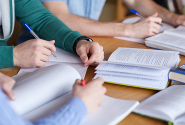 Student using a textbook